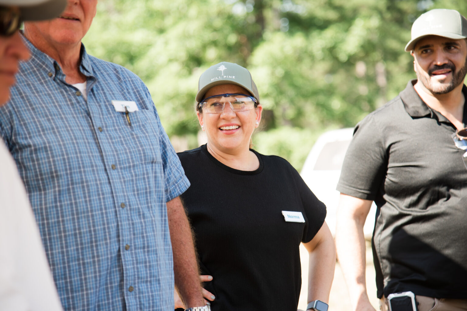 Caregivers smiling and bonding during a physical health activity.