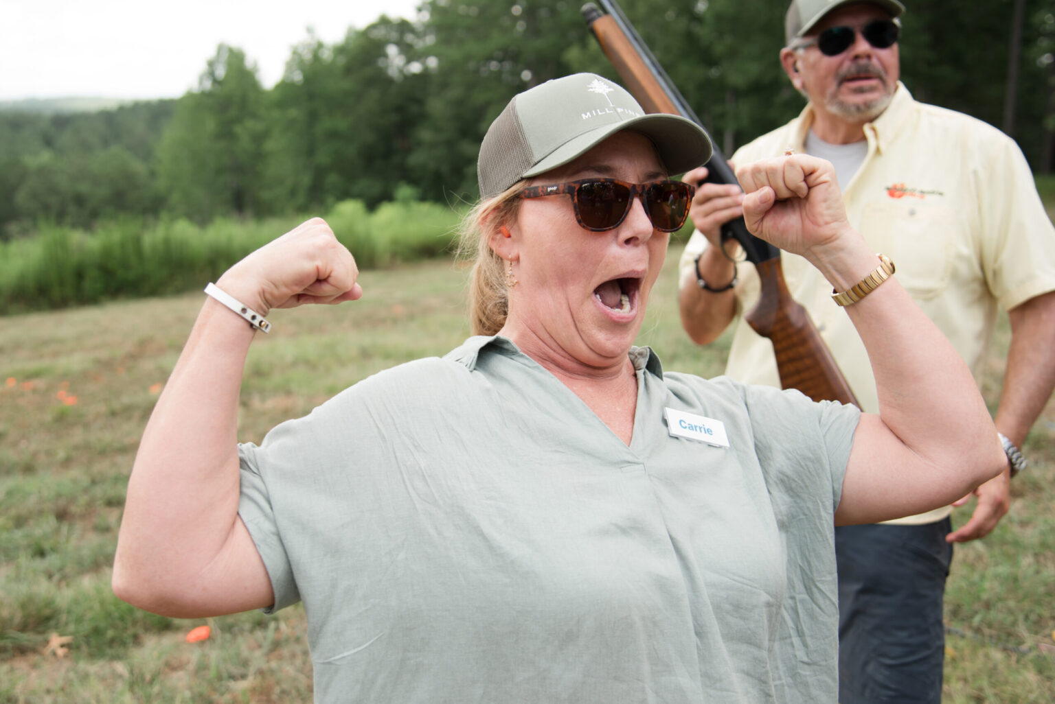 Caregiver cheering during outdoor activity promoting physical health and wellness.